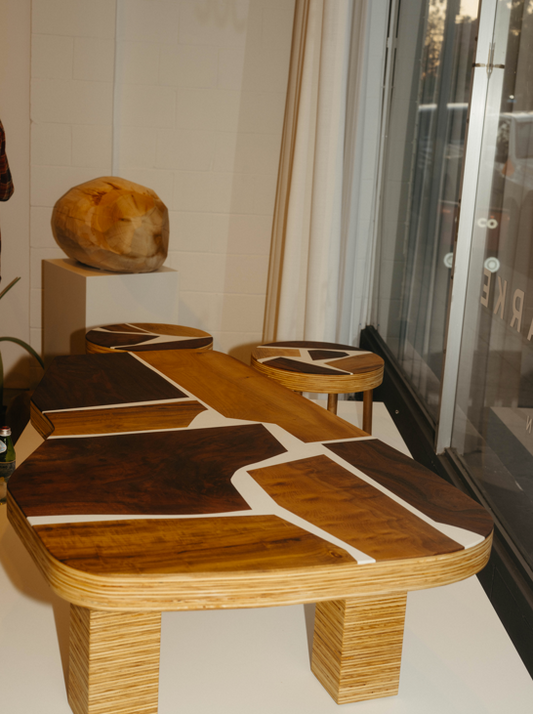 Bay Laurel, Claro Walnut coffee table with white fill.