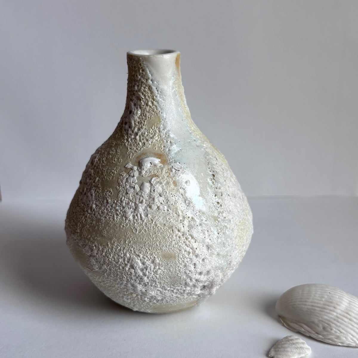 Yellow Sea shell vase by Annie Starling Sparks